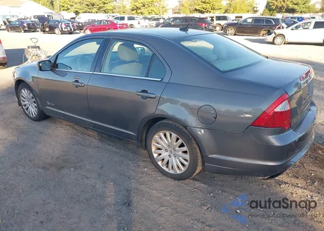 2011 Ford Fusion Hybrid z USA, uszkodzony, nr VIN 3FADP0L39BR123811